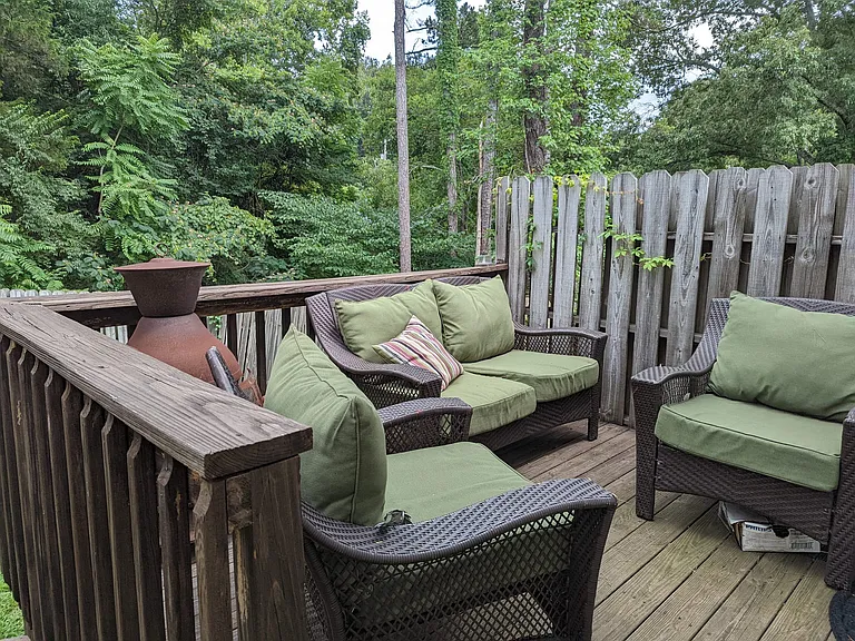 Fenced in yard with use of the deck.