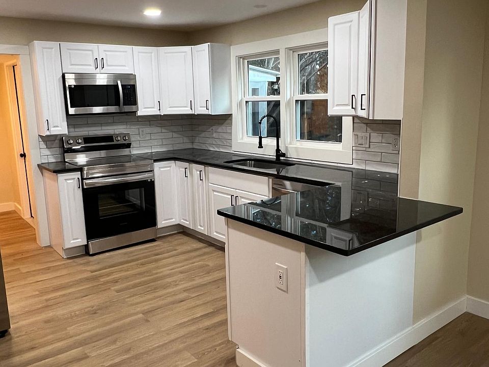 All new kitchen with granite and stainless appliances
