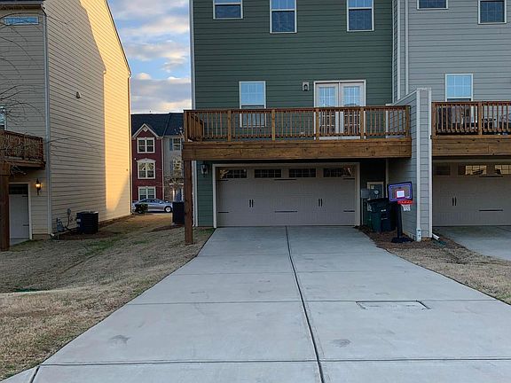 back view of house, long driveway