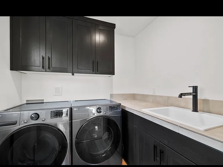 Laundry room with sink