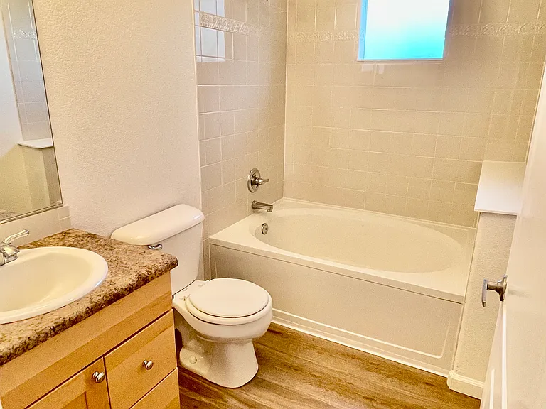 2nd full bath between 2nd bedroom and non-conforming 3rd bedroom