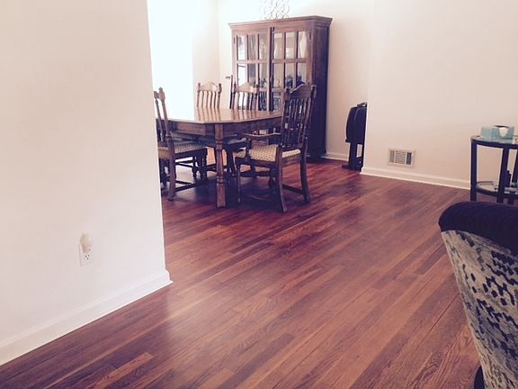 Dining Room
						:
						dining room table conveys with house, hard wood floors look great!