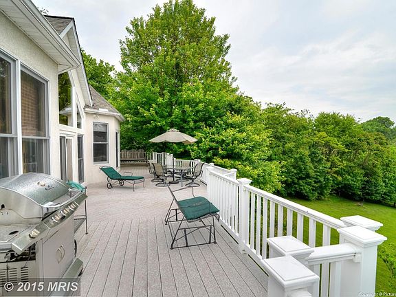 Large composite deck and vinyl railngs