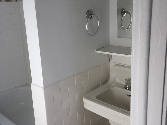 Small tiled bathroom.