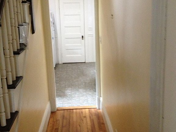 hallway view to 1/2 bath