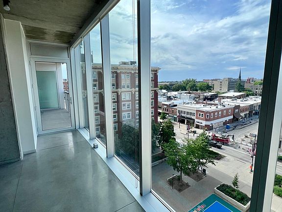 Main living space with door to balcony