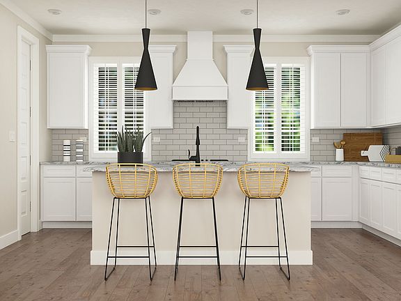 Stainless steel appliances are included in the kitchen