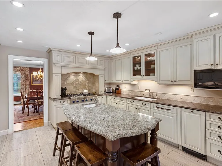 The kitchen island seats 4.