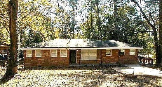 3359 Maplehurst Drive on wooded corner lot.