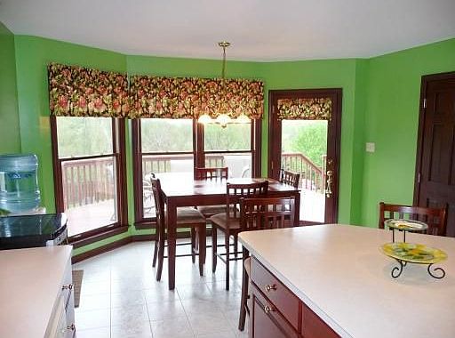 Breakfast Area w/ bay window & door to the deck.