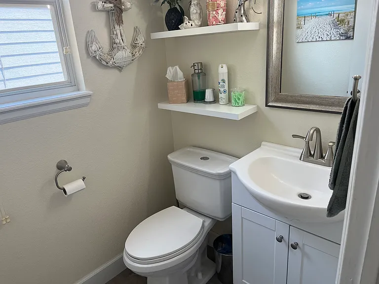 Half bathroom next to garage on main floor