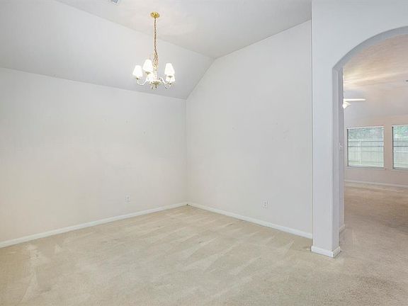 Open the door, and just off the entry is the formal dining room!