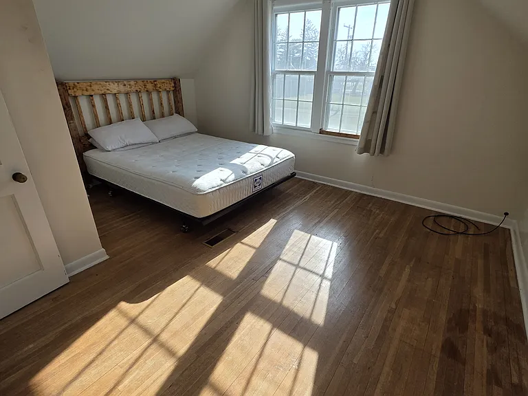 Upstairs Bedroom 2 - spacious closet as well as built-in cabinets for storage.