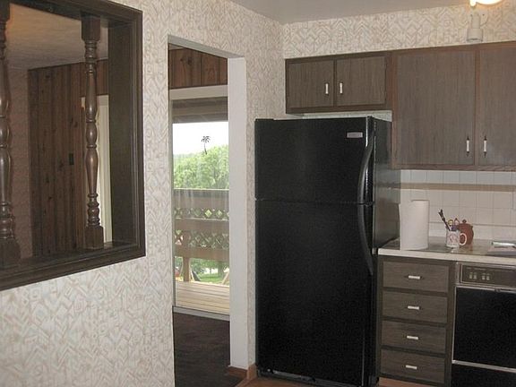Kitchen is open to the Dining Room  and close to the rear deck.