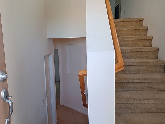 Entrance. Stairs to lving, dining, and master