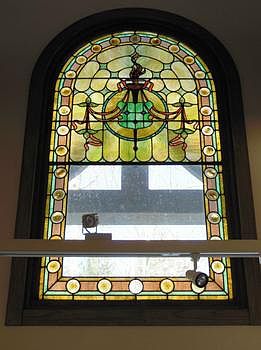 Inside the foyer the 1890's era stained glass "landing window" is even more impressive.  Rescued from a mansion in old Saginaw the sellers have loved it for years and hope the new owners will as well.