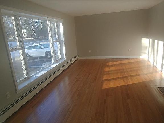 Living room, picture window and fireplace