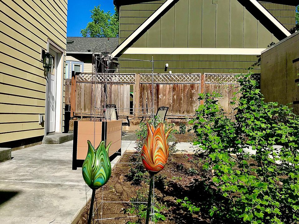 Garden space and patio outside your front door.