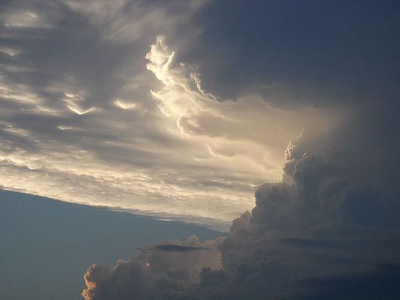 View of storm coming in over lake from cabin.