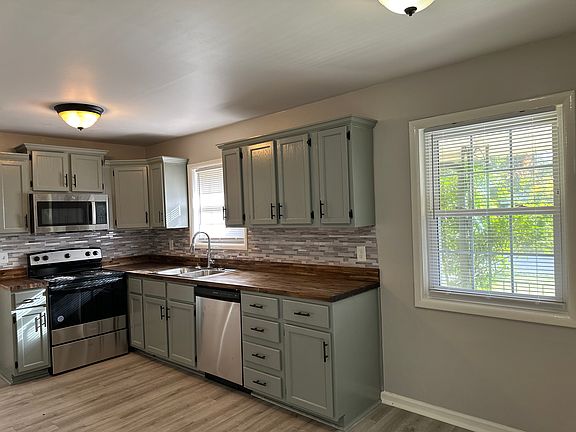 New update and renovated stainless steel appliances which butcher block counter included all light features are also new