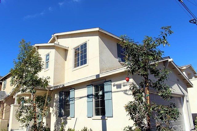 Corner unit with attached 2-car garage