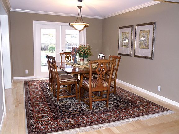 Formal Dining Room leads to the Pool and apres dinner fire pit