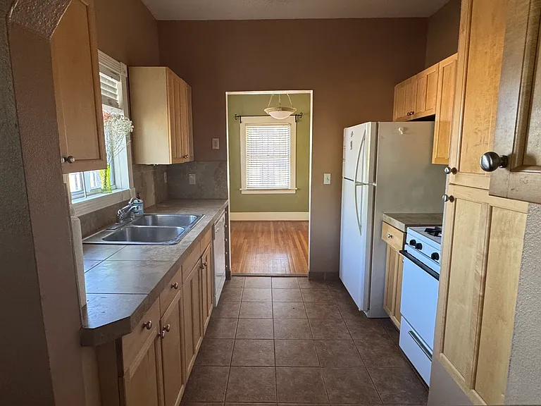 kitchen, with dining room in background