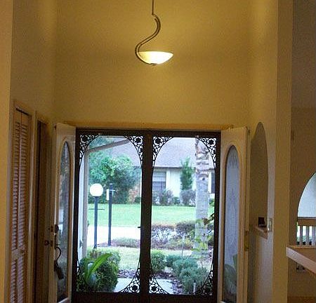 Inside Entryway with Beautiful Arthur Rutenberg Architecture and Double-Doors