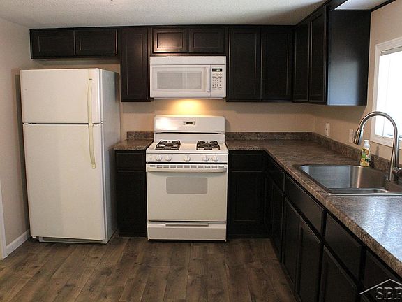 Beautiful new cabinetry, counters, appliances, and Pergo laminate flooring.