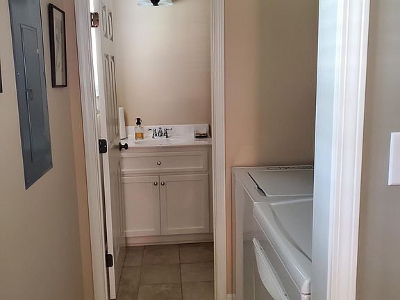 Laundry room and half bath main floor living area.