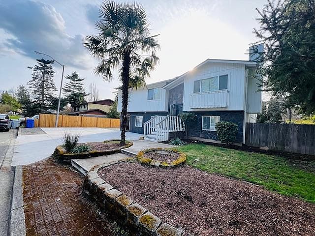 Front view of the house and front yard