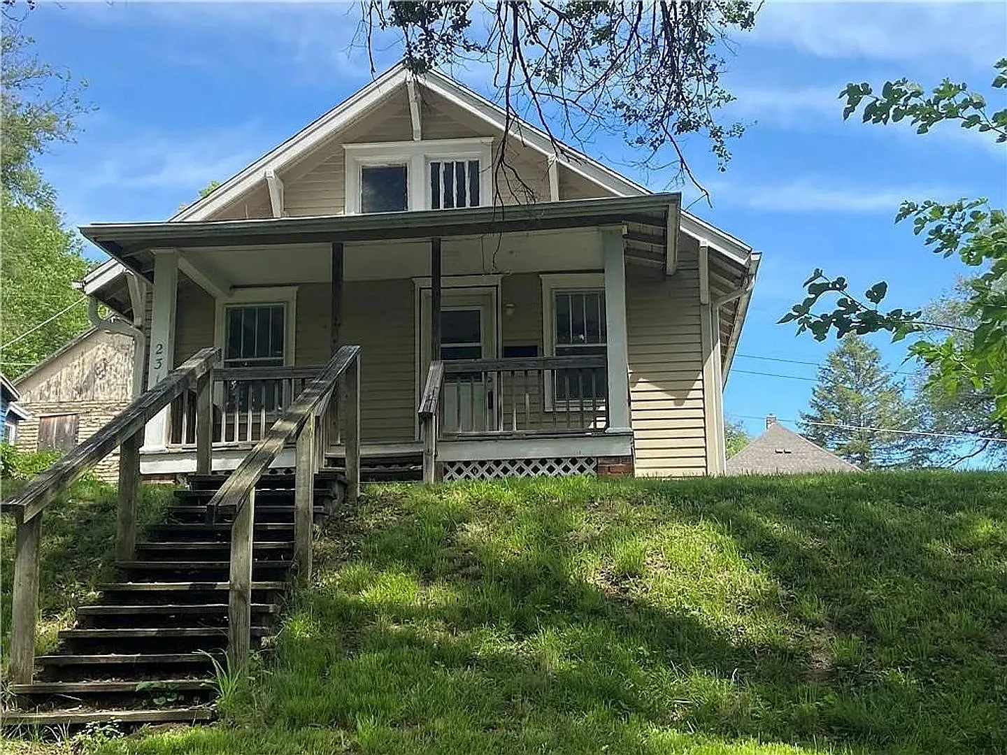 2-Bedroom Home with Covered Front Porch, Main-Floor Laundry & Off-Street Parking — Photo 2