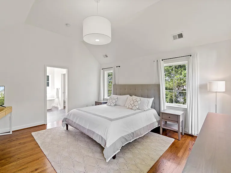 Master suite with vaulted ceilings