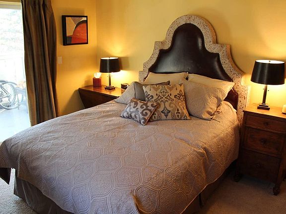 2nd Bedroom~ Queen bed, closet, drawer space, cable t.v., and access to balcony.