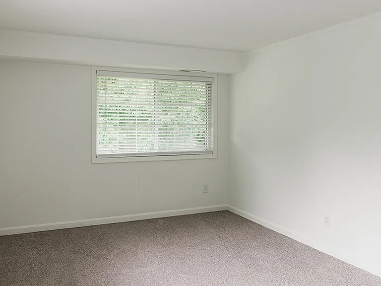 Spacious bedrooms with plush wall-to-wall carpeting