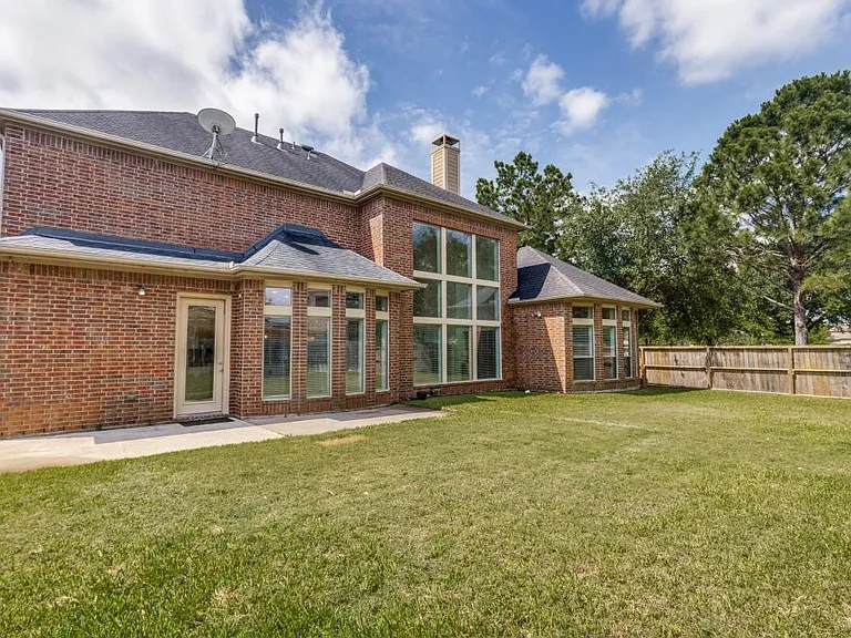 9318 Rainbluff Ln — Photo 29