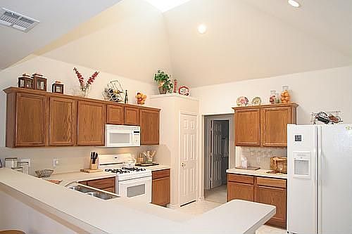 Bright Kitchen that Opens up to Living & Dining Room