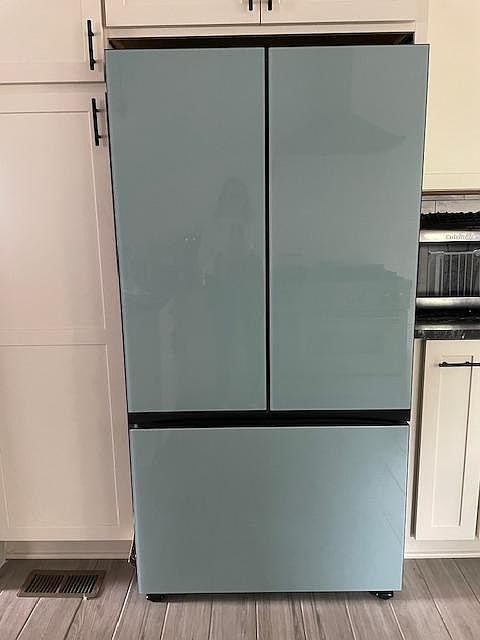 Beautiful blue glass front refrigerator