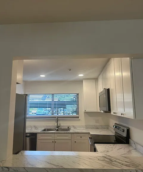 View from dining area into the renovated kitchen