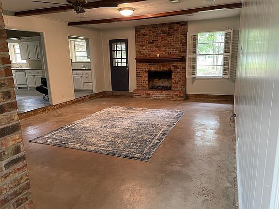 Huge living area with fireplace.
