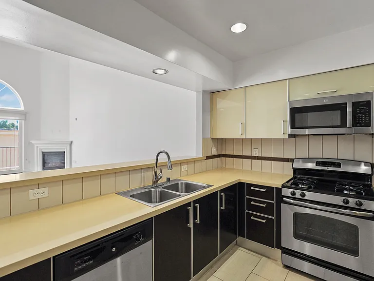 Kitchen with Stainless-Steel Stove, Microwave Oven, and Dishwasher