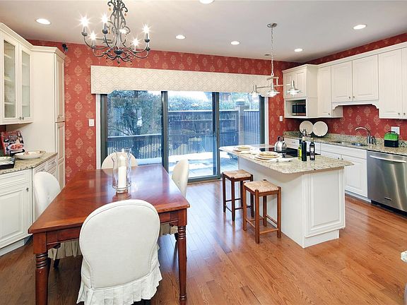 Large kitchen opens to a private patio - ideal for indoor and outdoor entertaining.