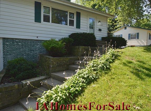 Landscaping - beautiful raised ranch with low maintenance landscaping