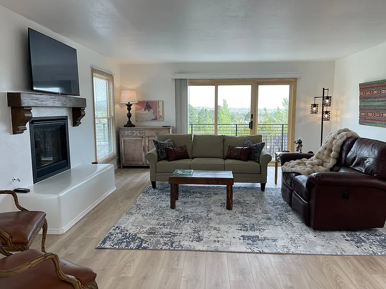 Living room with amazing views, gas fireplace, and Roku TV