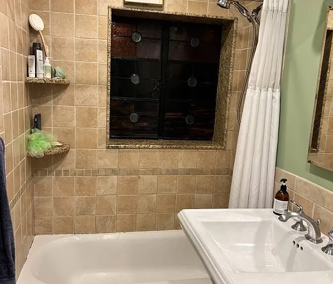 Bathroom with Stained-Glass Window and Pedastal Sink
