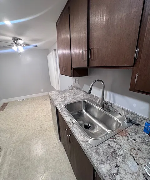 Huge SS sing with Garbage Disposal and under cabinet lighting.
Notice big eating area off kit.