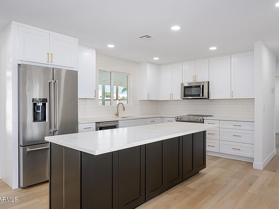 4th image of 7026 E VERNON Avenue