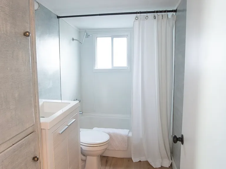 Second bathroom with shower/tub combo
