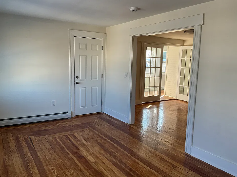Front door from living room with dining room on right.