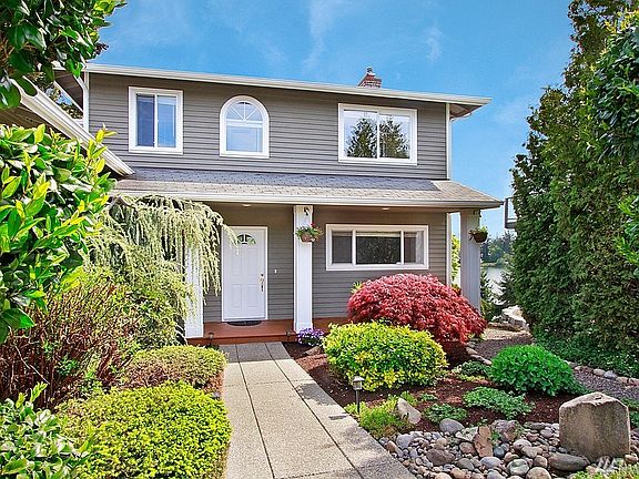 Cute and inviting front porch. 